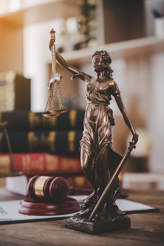 Lady justice,Law theme, mallet of the judge, law enforcement officers, evidence-based cases and documents taken into account.