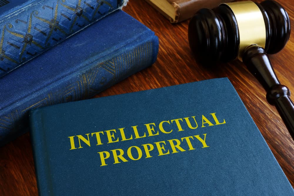 Intellectual property law about copyright on desk.
